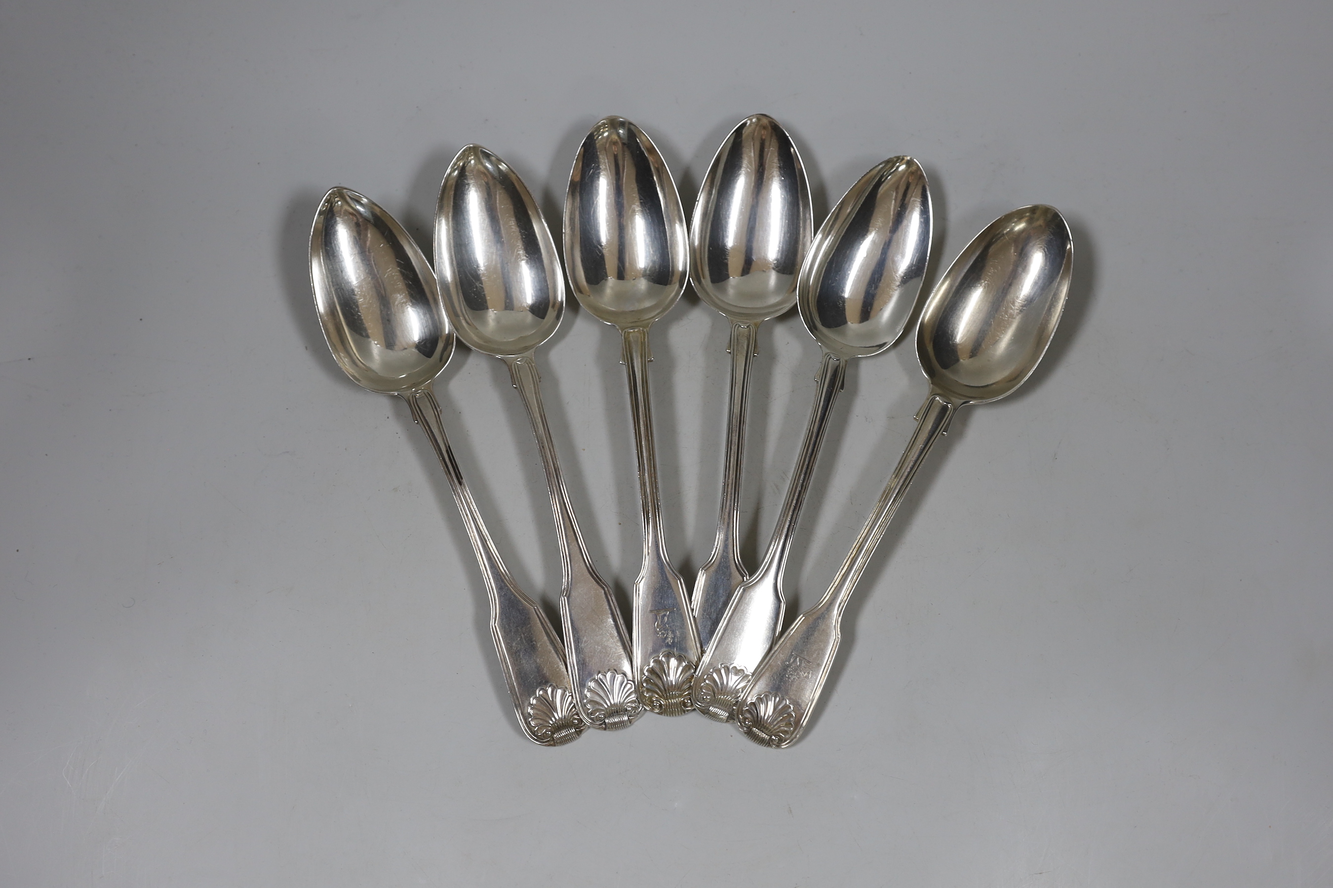 A harlequin set of six early to mid 19th century silver fiddle, thread and shell pattern table spoons, various dates and makers, 16.2oz.